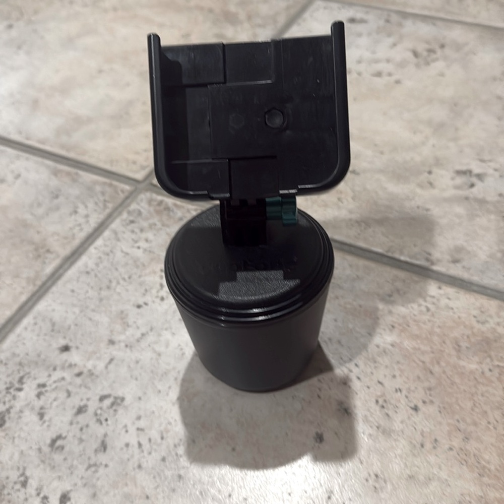 Weathertech CupFone holder. Adjusts to hold your phone. Like new!